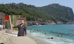 Denize atlayarak başını kuma çarpan genç hayatını kaybetti