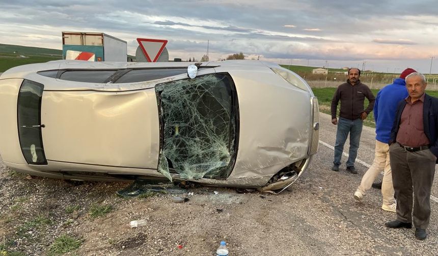 Takla atan otomobilden burnu bile kanamadan kurtuldu